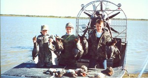 3 boys duck hunting